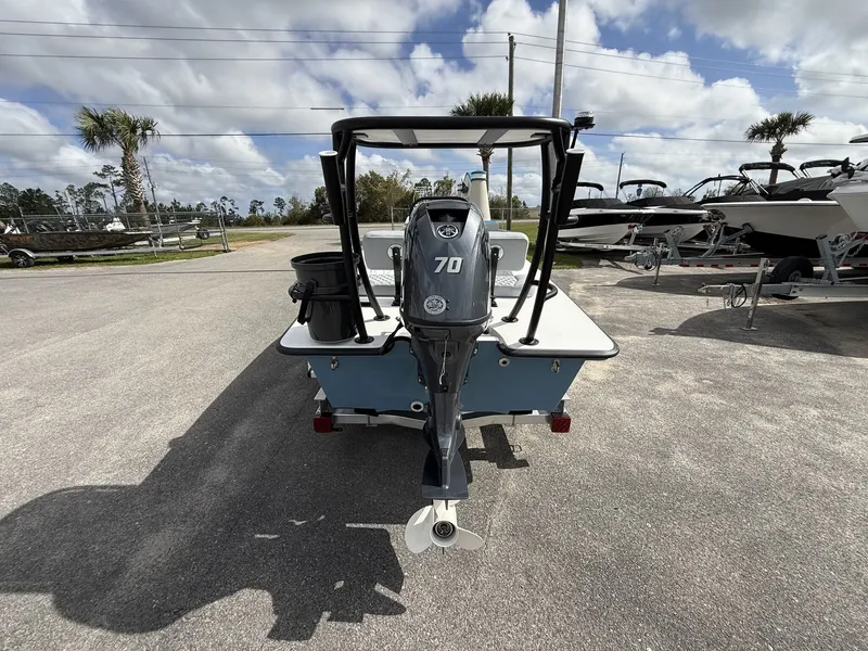 Slide: The Image of Delta Boatworks D18 CC Guide Series 2026 with outboard motor. - 5