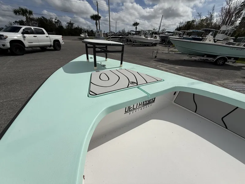 Slide: The Image of Delta Boatworks D18 CC Guide Series 2026 on parking lot. - 3