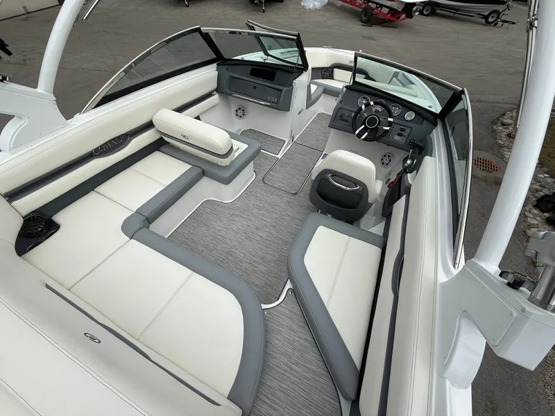 Slide: The Image of Interior of 2022 Cobalt CS23 Surf with gray and white seating. - 30
