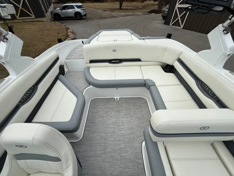 Slide: The Image of Interior of 2022 Cobalt CS23 Surf with luxurious white seating. - 33