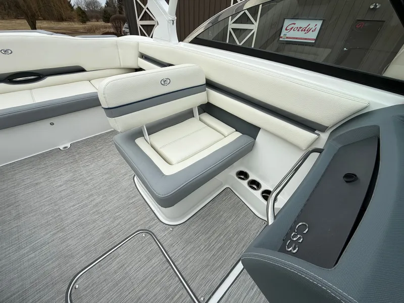 Slide: The Image of Interior of 2022 Cobalt CS23 Surf with gray and white seating. - 35