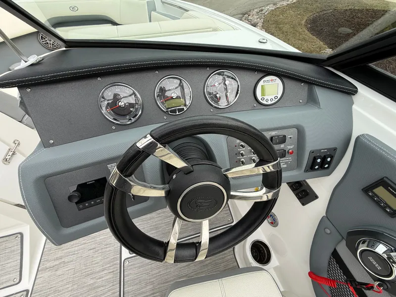 Slide: The Image of Dashboard of 2022 Cobalt CS23 Surf with steering wheel and gauges. - 38
