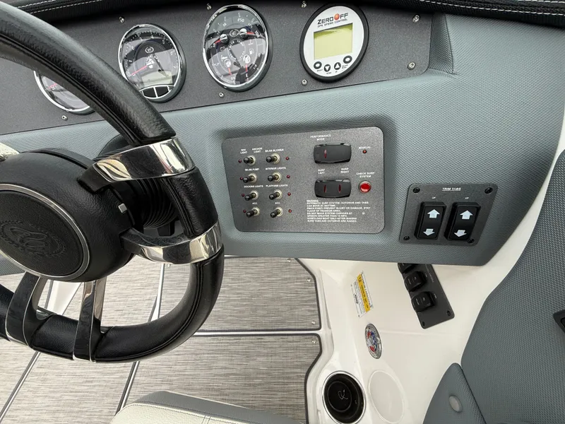 Slide: The Image of Dashboard of 2022 Cobalt CS23 Surf with controls and gauges. - 40
