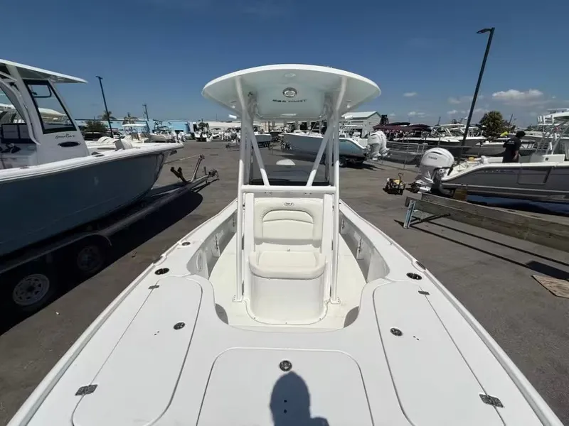 Slide: The Image of 2026 Sea Hunt BX 22 BR boat in a parking lot. - 8