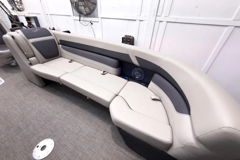 Slide: The Image of 2025 Barletta Cabrio 24UC boat interior with luxurious seating and modern design. - 10
