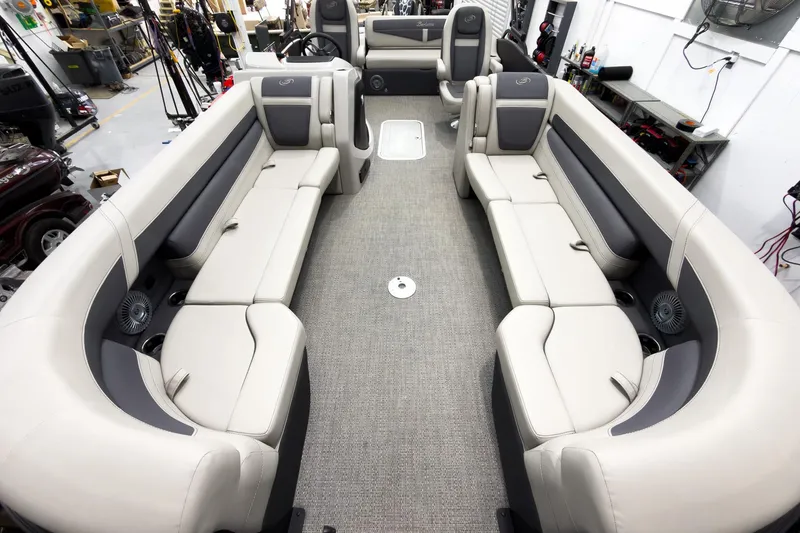 Slide: The Image of 2025 Barletta Cabrio 24UC pontoon boat interior with spacious seating and modern design. - 8