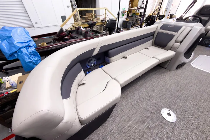 Slide: The Image of Luxurious seating in 2025 Barletta Cabrio 24UC pontoon boat, featuring elegant design and comfort. - 9