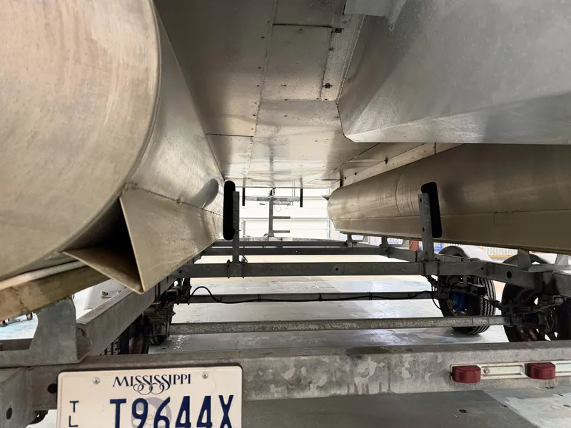 Slide: The Image of Underside of a Lowe SS 210 pontoon boat on trailer, Mississippi license plate. - 20
