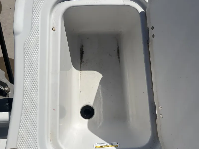 Slide: The Image of Interior compartment of a 2016 Tahoe 550 TS boat. - 25