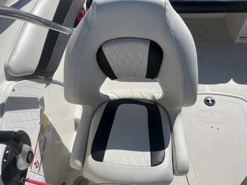 Slide: The Image of Seat of a 2016 Tahoe 550 TS boat with two-tone upholstery. - 30