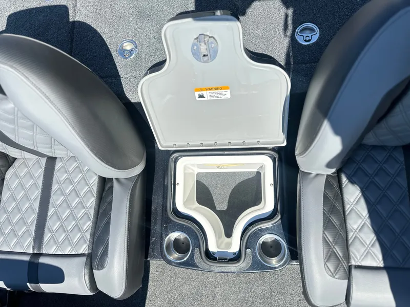 Slide: The Image of Interior of 2027 Caymas CX 201 PRO with storage and seats. - 17