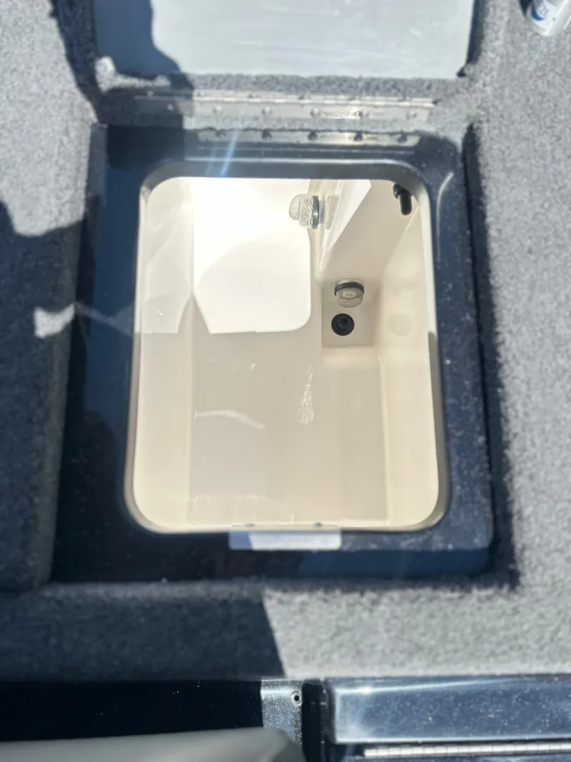 Slide: The Image of Interior view of Caymas CX 201 PRO 2027 storage compartment. - 19