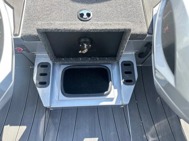 Slide: The Image of Interior of Vexus AVX 1985s 2026 with storage compartment and locker. - 11