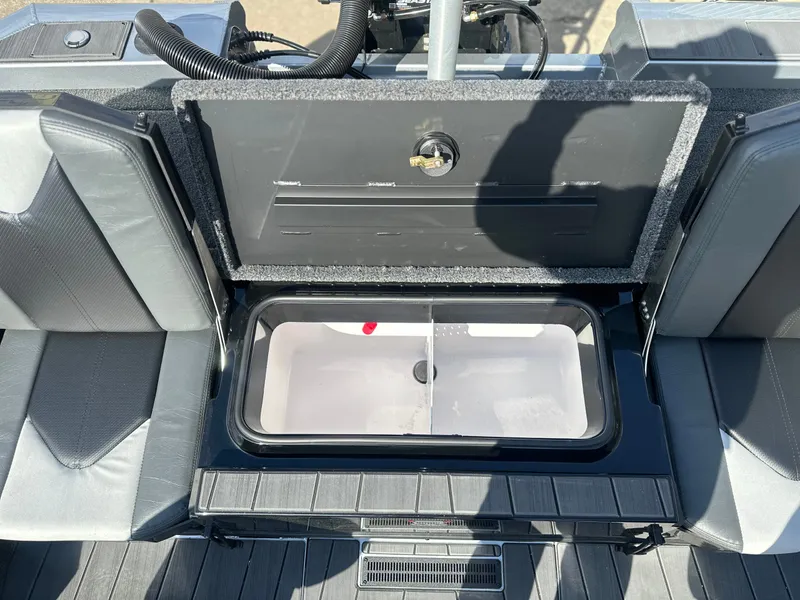 Slide: The Image of Vexus AVX 1985s 2026 boat with open storage compartment. - 9