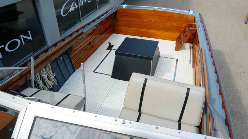 Slide: The Image of Interior of a 1966 Chris-Craft Sea Skiff with wooden detailing. - 15
