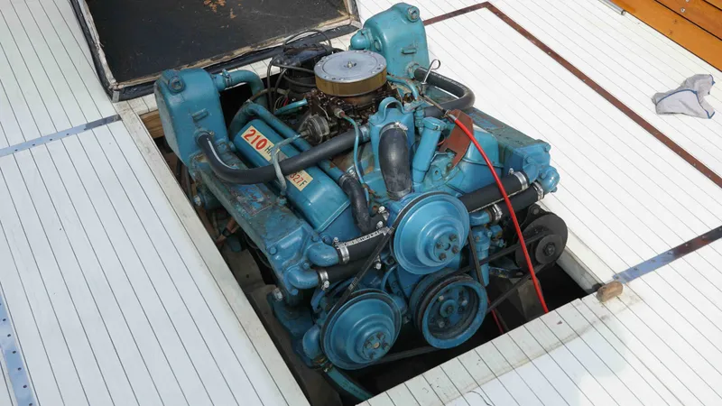 Slide: The Image of Engine of a 1966 Chris-Craft Sea Skiff boat, exposed for maintenance. - 16
