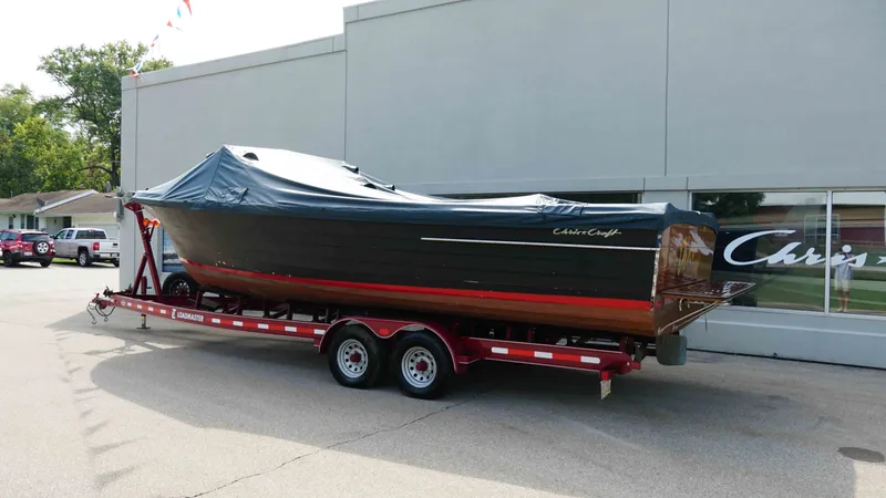 Slide: The Image of 1966 Chris-Craft Sea Skiff on trailer outside building. - 18