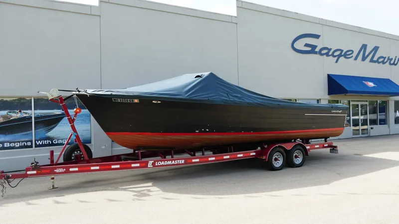 Slide: The Image of 1966 Chris-Craft Sea Skiff on trailer outside Gage Marine. - 19