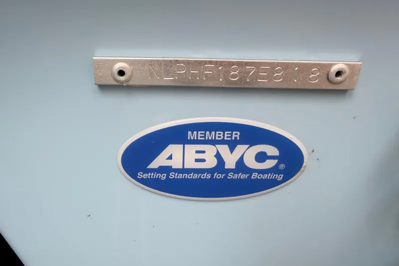 Slide: The Image of 2018 Tidewater 232 SS boat with ABYC membership plaque and serial number. - 20