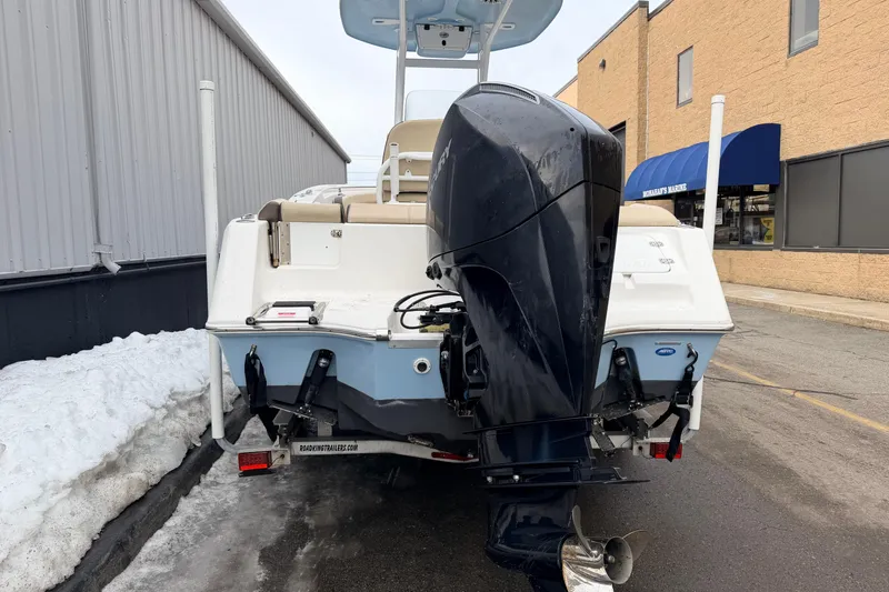 Slide: The Image of Rear view of a 2018 Tidewater 232 SS boat with an outboard motor. - 6