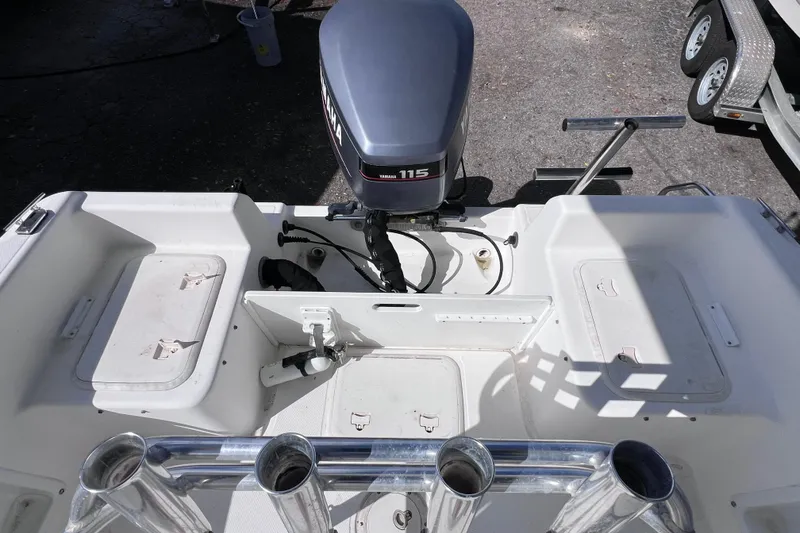 Slide: The Image of 2001 Cobia 194 Center Console boat with Yamaha 115 outboard motor. - 10