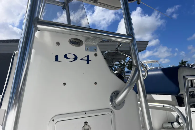 Slide: The Image of 2001 Cobia 194 Center Console boat with blue skies and clouds in the background. - 21