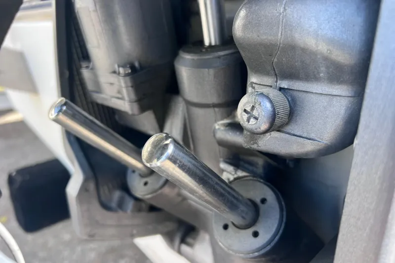 Slide: The Image of Close-up of a 2001 Cobia 194 Center Console boat engine components. - 22