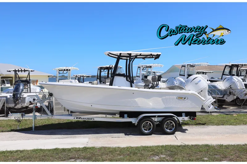 The Image of 2026 Sea Hunt Ultra 219 boat on trailer at Castaway Marine dealership. - 0