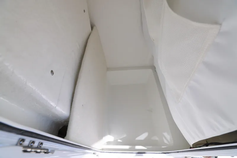 Slide: The Image of Interior storage compartment of 2026 Sea Hunt Ultra 219 boat. - 11