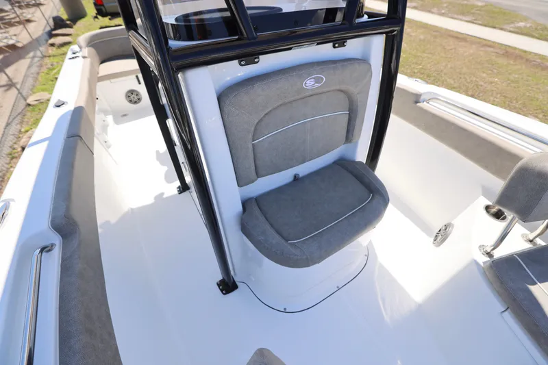 Slide: The Image of 2026 Sea Hunt Ultra 219 boat interior with gray seating and sleek design. - 14