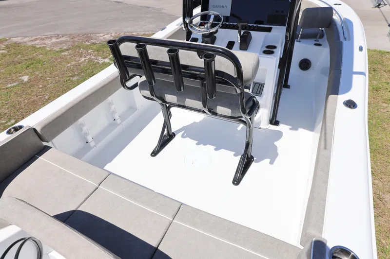 Slide: The Image of 2026 Sea Hunt Ultra 219 boat interior with seating and steering console. - 8