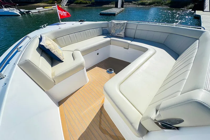 Slide: The Image of Luxurious seating area on 2024 MJM 4 boat, featuring elegant cushions and sleek design. - 13