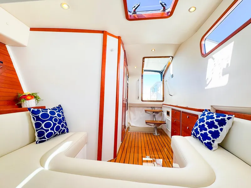 Slide: The Image of Luxurious 2024 MJM 4 yacht interior with elegant seating and nautical decor. - 36