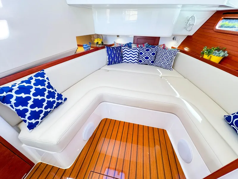 Slide: The Image of Luxurious 2024 MJM 4 yacht interior with elegant seating and decorative pillows. - 37
