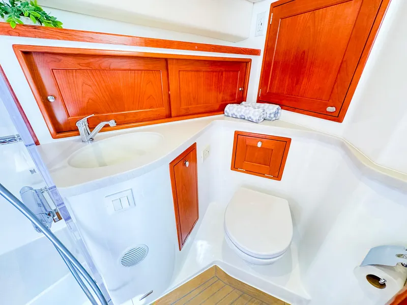 Slide: The Image of 2024 MJM 4 yacht bathroom with wooden cabinets and modern fixtures. - 40