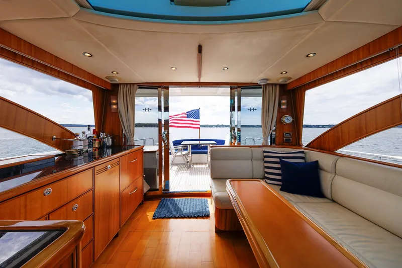 Slide: The Image of Luxurious 2009 Hunt Yachts 52 Express interior with elegant wood finish and scenic ocean view. - 23