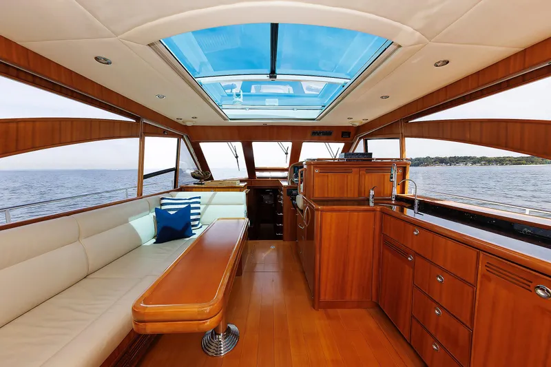 Slide: The Image of Luxurious interior of 2009 Hunt Yachts 52 Express with wood finish and ocean view. - 26