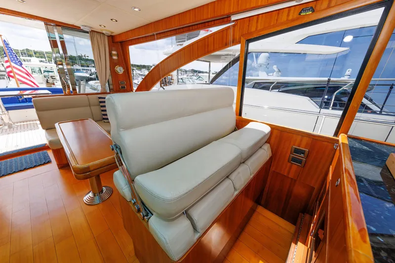 Slide: The Image of Luxurious interior of 2009 Hunt Yachts 52 Express with elegant seating and wooden finishes. - 30