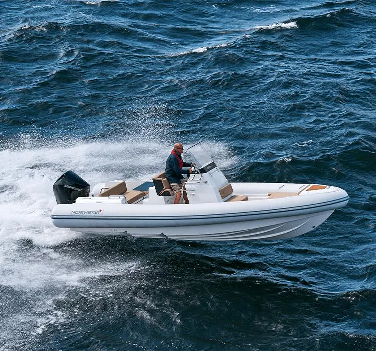 Slide: The Image of 2023 Northstar Orion 7 boat speeding on open water, showcasing sleek design and performance. - 9