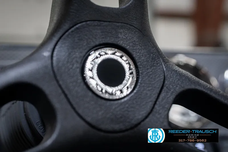 Slide: The Image of Close-up of 2026 Lund 1775 Adventure SS steering wheel with logo detail. - 30
