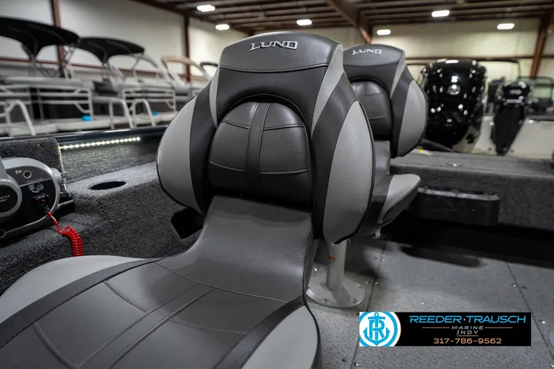 Slide: The Image of 2026 Lund 1775 Adventure SS boat interior with sleek seating and modern design. - 34