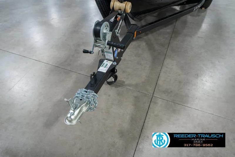 Slide: The Image of Trailer hitch of 2026 Lund 1775 Adventure SS boat on showroom floor. - 49