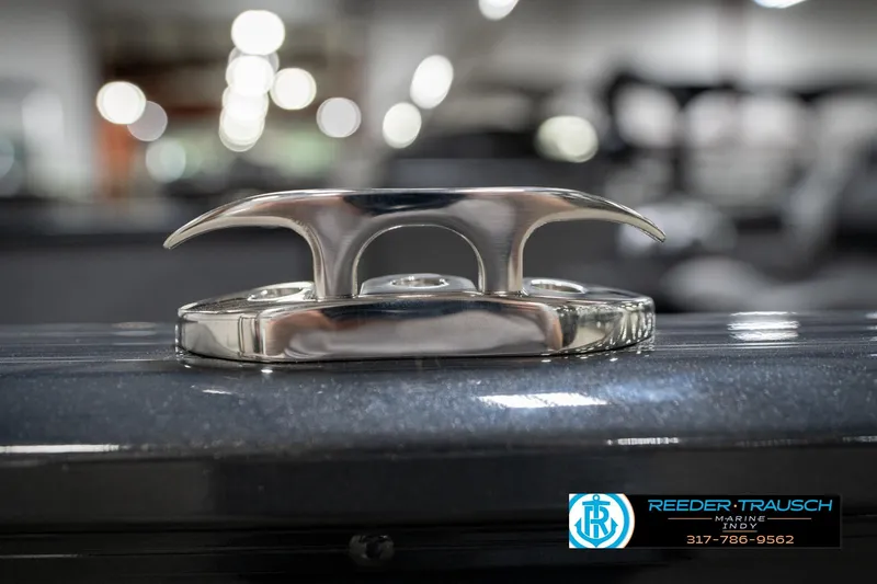 Slide: The Image of 2026 Lund 1775 Adventure SS boat cleat, shiny metal finish, close-up view. - 53