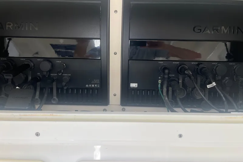 Slide: The Image of Garmin marine electronics on a 2017 SeaVee 370Z boat, showcasing various connections. - 12