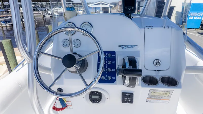 Slide: The Image of Steering console of a 2019 Glasstream 221cc boat at the marina. - 10