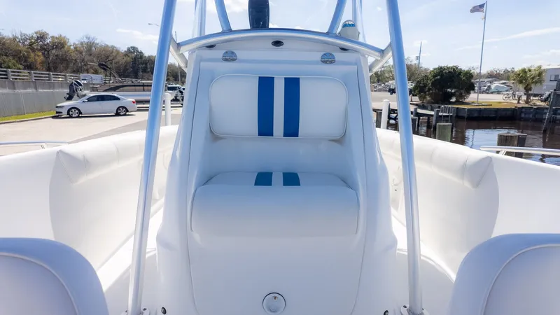 Slide: The Image of Interior view of a 2019 Glasstream 221cc boat with blue stripes. - 13