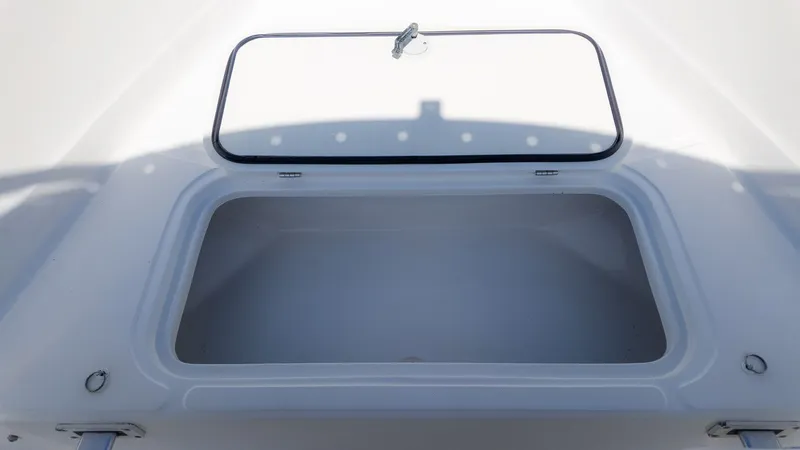 Slide: The Image of Glasstream 221cc 2019 storage compartment with open lid. - 16