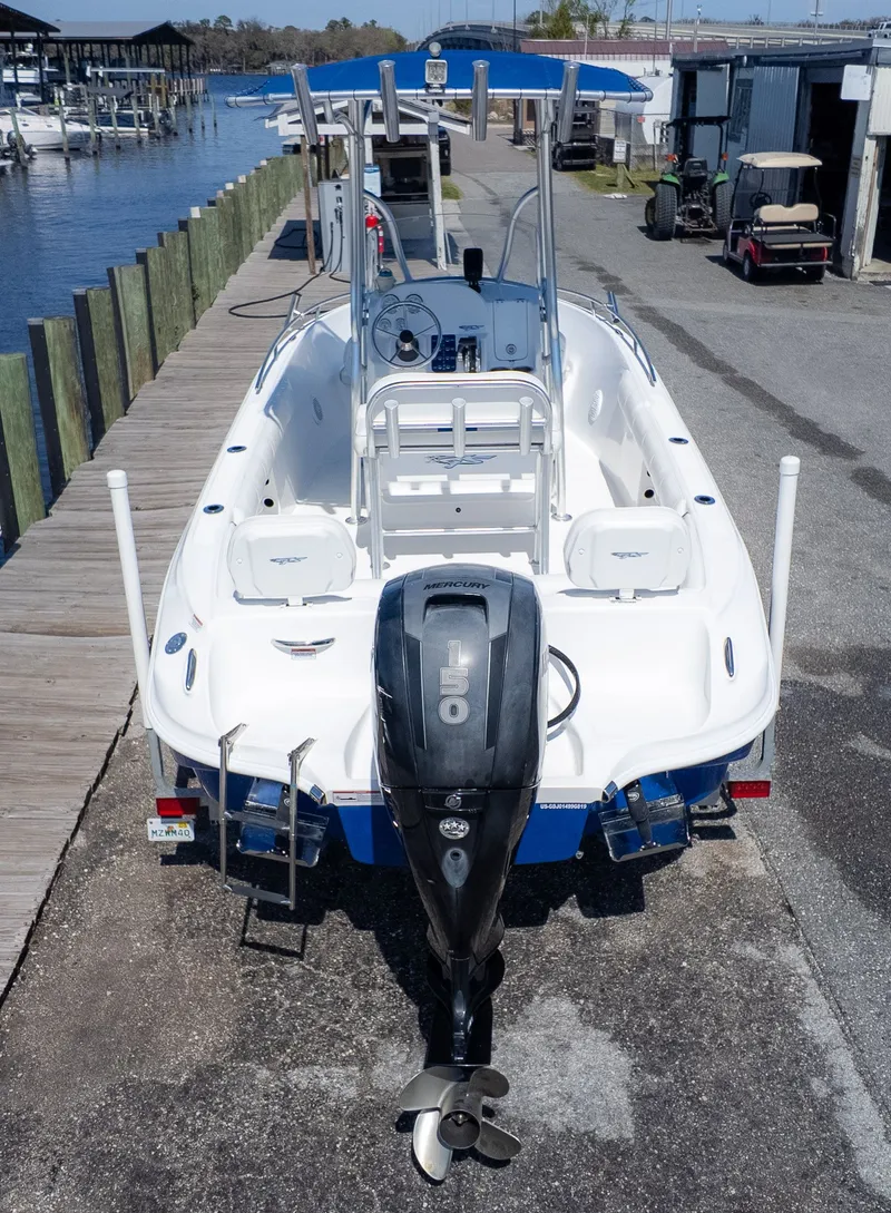 Slide: The Image of 2019 Glasstream 221cc boat at dock with outboard motor. - 4
