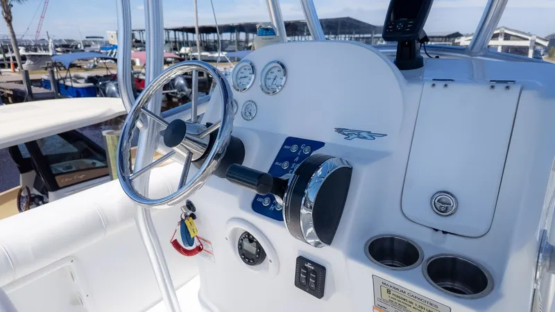 Slide: The Image of Steering console of a 2019 Glasstream 221cc boat at the marina. - 9