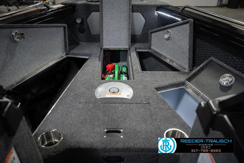 Slide: The Image of Interior of 2026 Lund 1975 Tyee boat with storage compartments and modern design. - 29